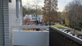 Balkon mit Blick auf die Haumannplatzwiese