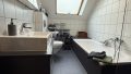 Badezimmer mit Wanne
