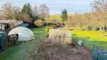 Gartenansicht mit Pool unter der Kuppel