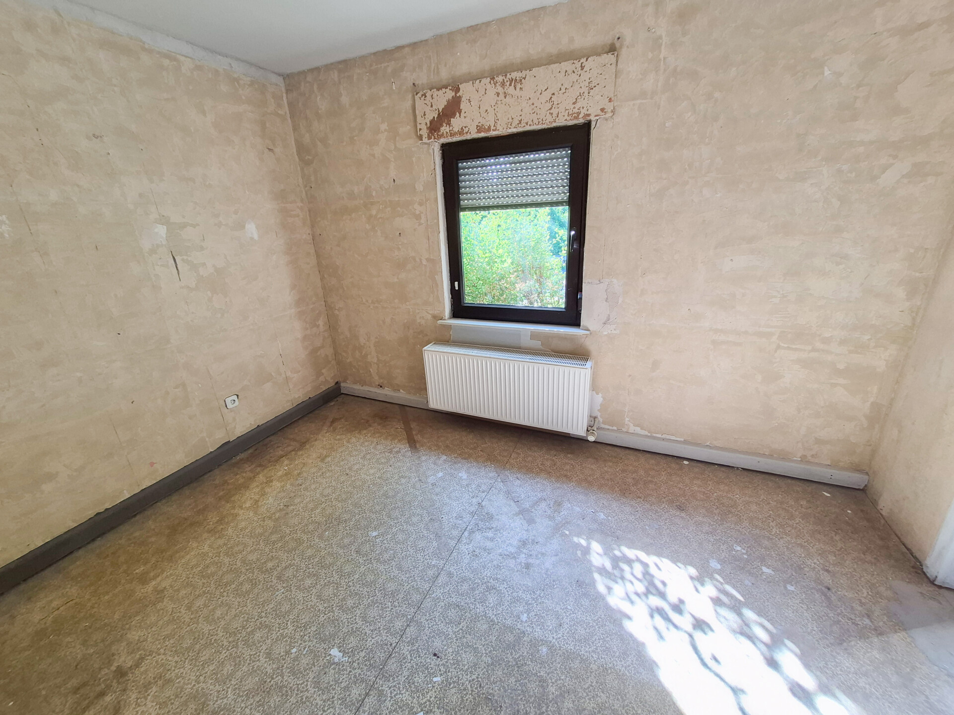 Wohnzimmer - Wohnung links