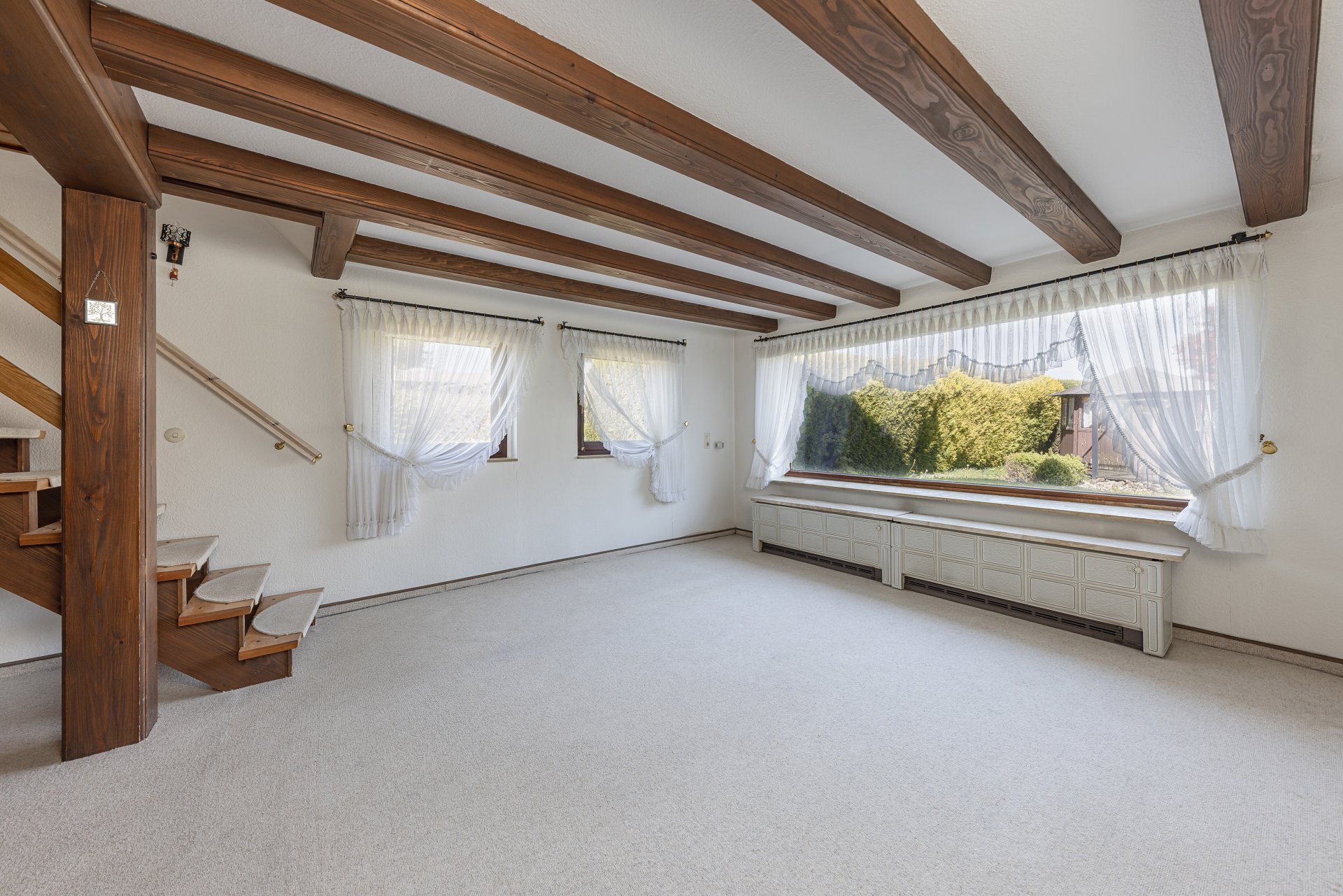 Wohnzimmer mit Grünblick