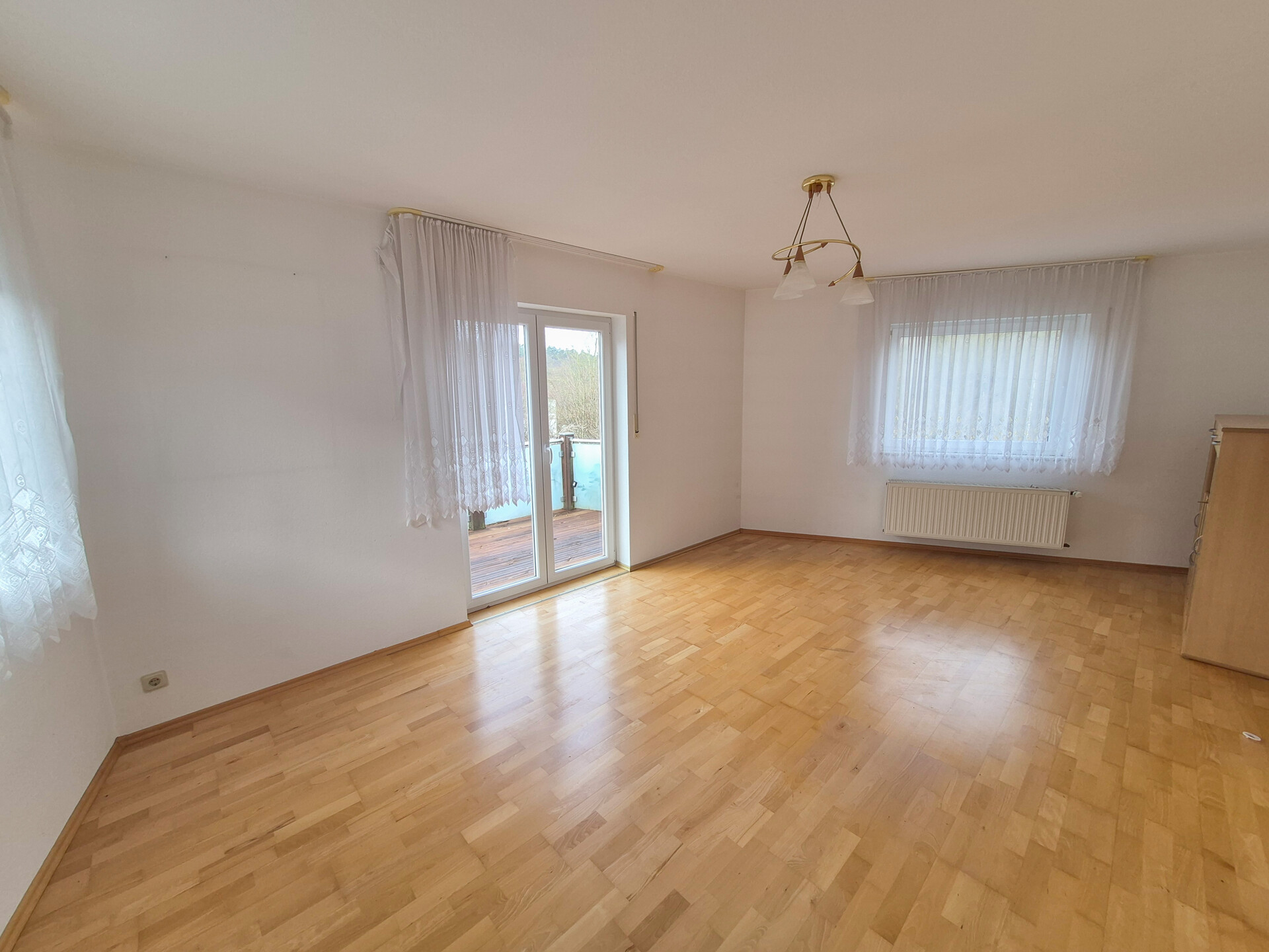 Zimmer mit Balkon